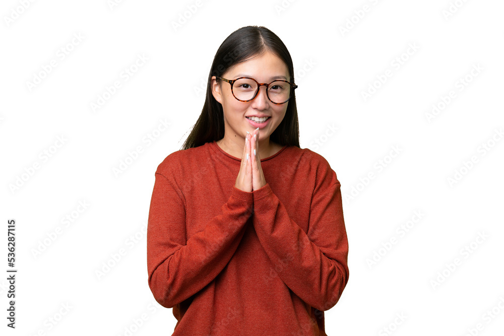 Young Asian woman over isolated background having doubts Young Asian woman over isolated background having doubts