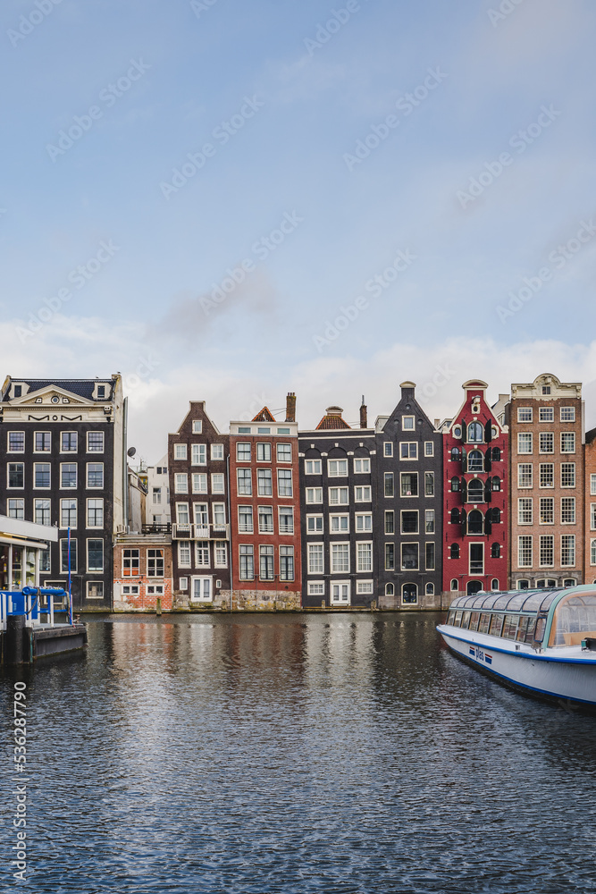 Dancing Houses Damrak Amsterdam during the day Netherlands Holland