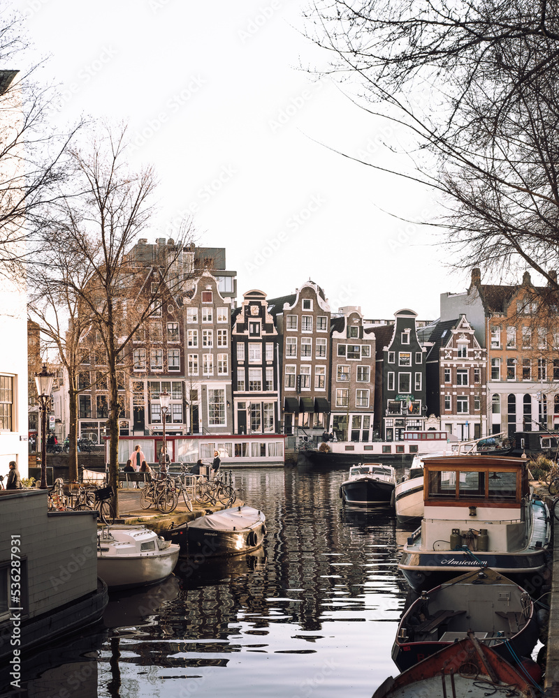 Amsterdam Panoramic view of canal during end of the day grey Netherlands