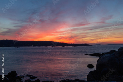 Bonita puesta de sol en la ría de Aldán. Rías Baixas, Galicia, España.	 photo