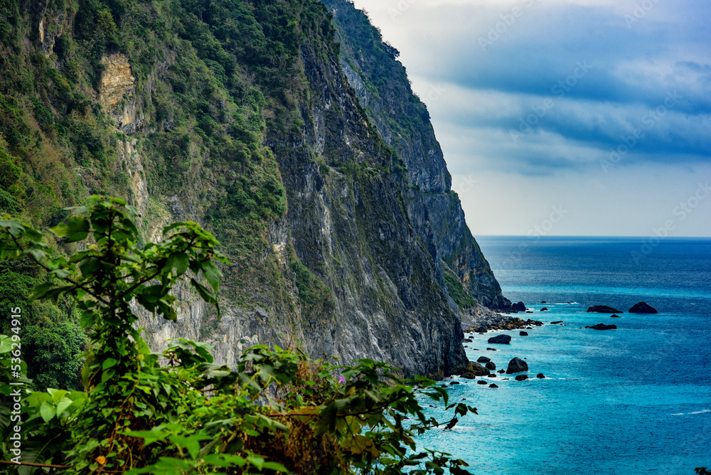 A peaceful seascape with turquoise waters at the cliffs of Taroko National Park in the Pacific Coast of Taiwan