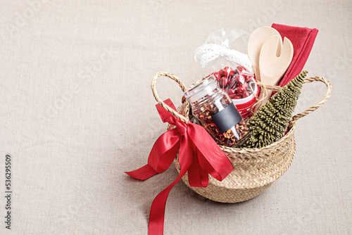 Refined Christmas gift basket for culinary enthusiats with mug  fruit tea and kitchen utensils. Corporate or personal present for cooking lovers  foodies and gourmands.