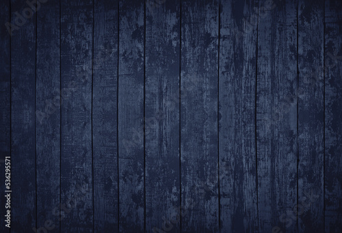 Black blue wooden texture. Dark painted old wood. Rough planks. Dark rustic background with space for design.