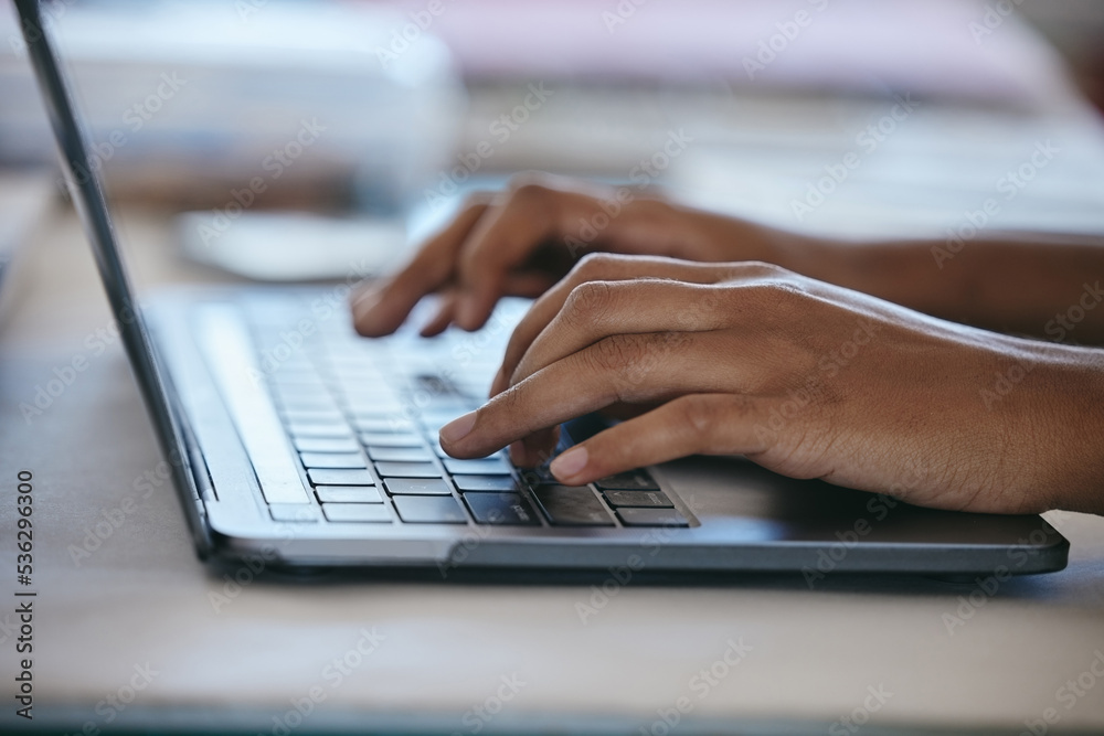 Hands typing, laptop and working freelance woman busy writing email or social media content while sitting at a table. Closeup of online planning, web search and internet browsing female using website Hands typing, laptop and working freelance woman busy writing email or social media content while sitting at a table. Closeup of online planning, web search and internet browsing female using website