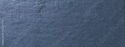 Panel kuchenny z motywem Navy blue background of natural slate. Texture of rough dark cool gray stone backdrop, closeup.
