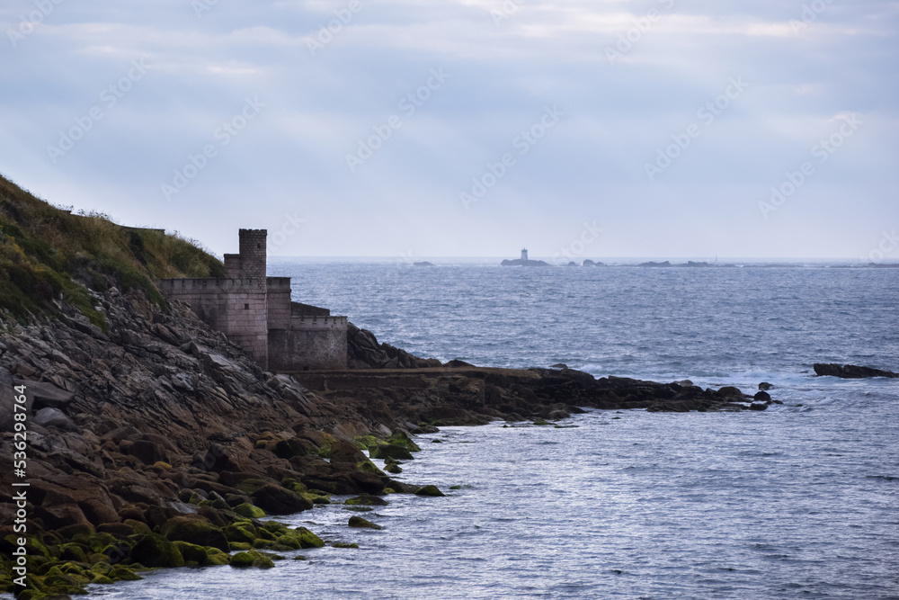 Small watchtower by the sea. Tower located on the promenade that surrounds the Parador and the Monterreal fortress. Baiona - Spain