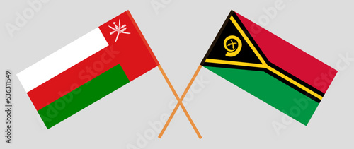 Crossed flags of Oman and Vanuatu. Official colors. Correct proportion