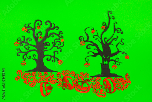 Halloween Tree with Orange Pumpkins on the green screen background.
