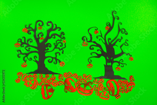 Halloween Tree with Orange Pumpkins on the green screen background.