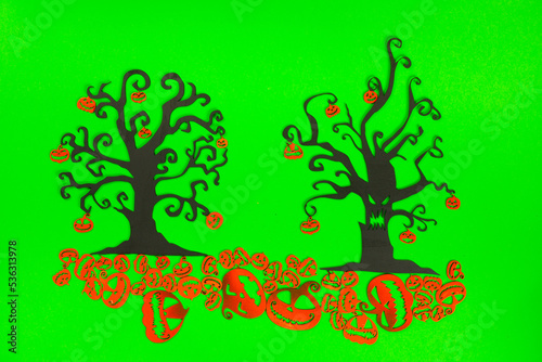 Halloween Tree with Orange Pumpkins on the green screen background.