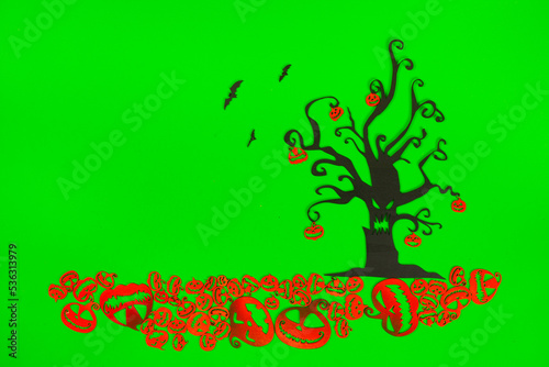 Halloween Tree with Orange Pumpkins on the green screen background.