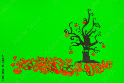 Halloween Tree with Orange Pumpkins on the green screen background.