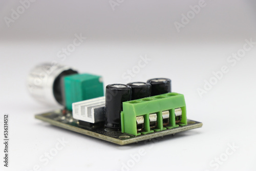 Fototapet DC Motor speed controller board that regulates motor speed using pulse width mod