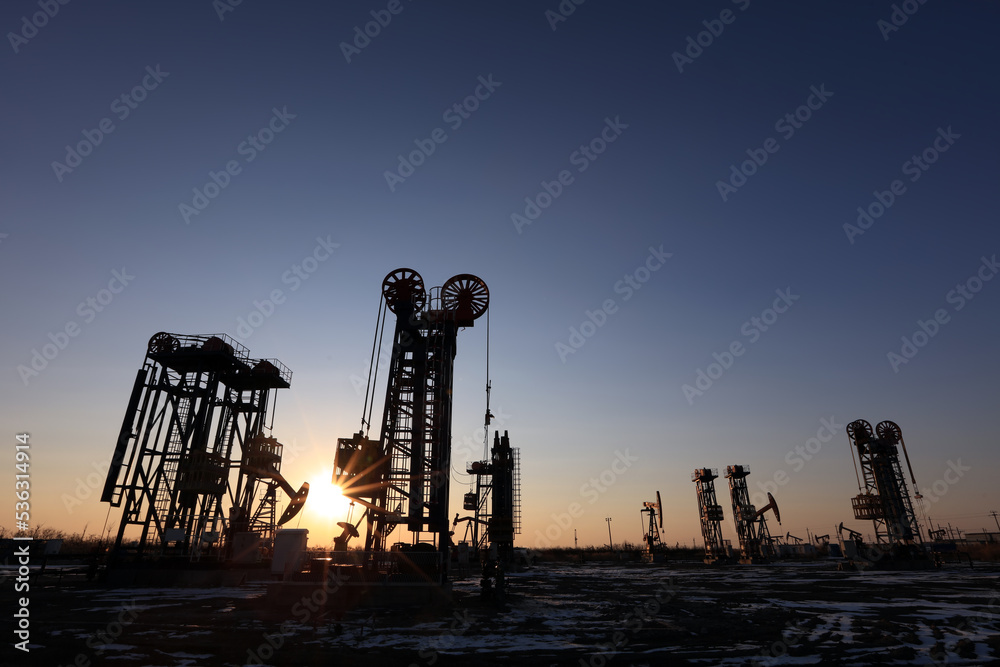 Tower pumping unit in the evening