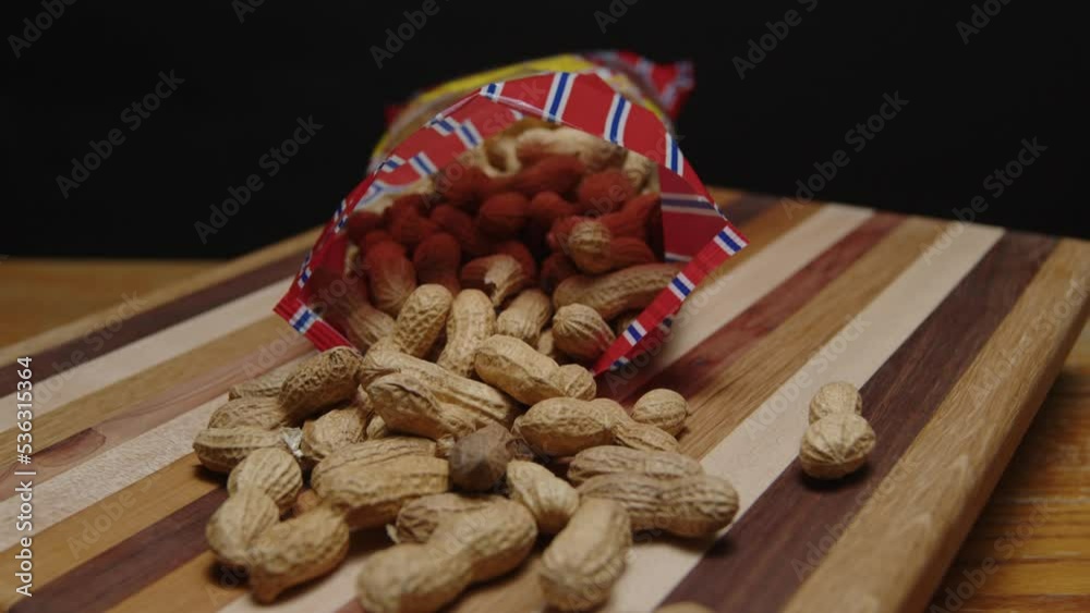 bag of peanuts spinning on a cutting board