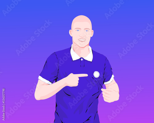 Sports player wearing team jersey pointing at club badge