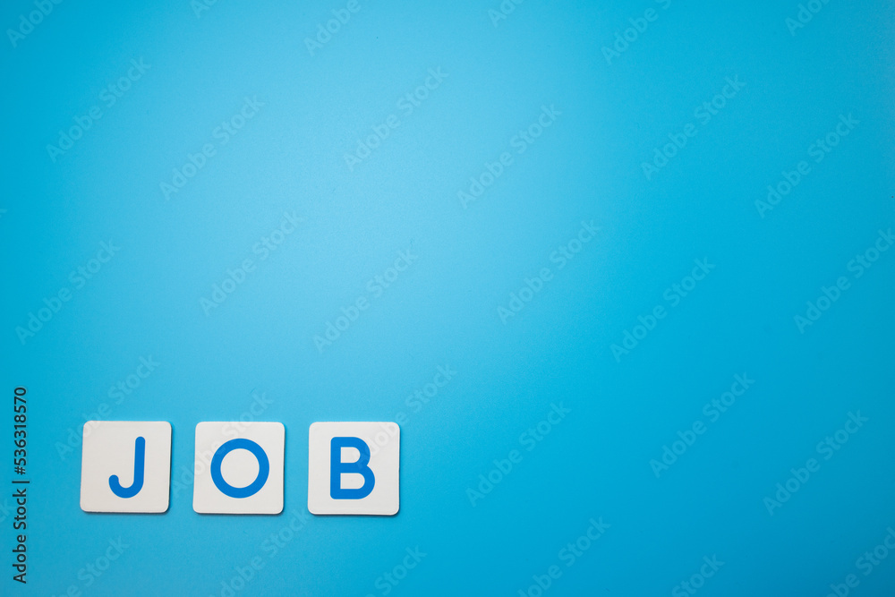 Word JOB on blue background,obtain employment concept. Word JOB on blue background,obtain employment concept.
