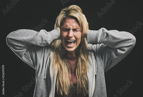 Vászonkép Anxiety, bipolar woman crying, frustrated or crazy on a dark studio for psychology and mental health mock up