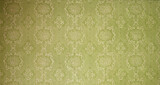 Old wallpaper on the wall. Old wallpaper for texture or background.