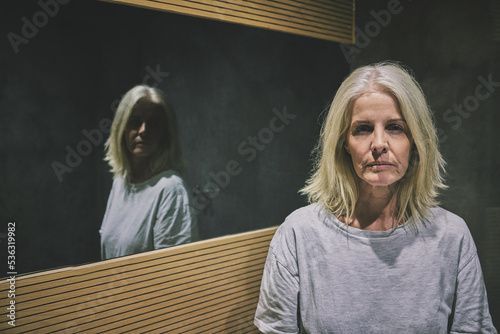 Cuadro en lienzo Mature woman, depression or mental health by bathroom mirror of house, home or hotel