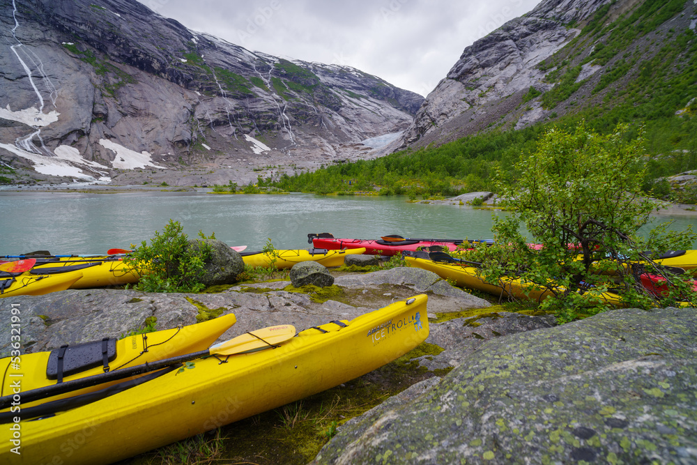 Fototapeta premium yellow canoes for rent