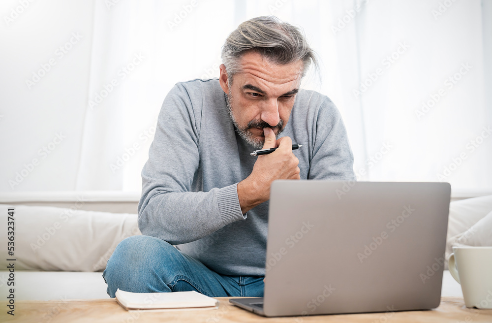 Portrait of stress sad business senior old caucasian man working late in living room home office. Business man work hard lifestyle stress burnout overtime office syndrome, broke poor senior guy. Portrait of stress sad business senior old caucasian man working late in living room home office. Business man work hard lifestyle stress burnout overtime office syndrome, broke poor senior guy.