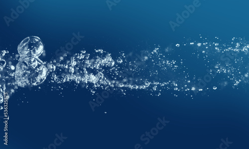 Air bubbles in the water background. Abstract oxygen bubbles in the sea. Water bubbles. photo