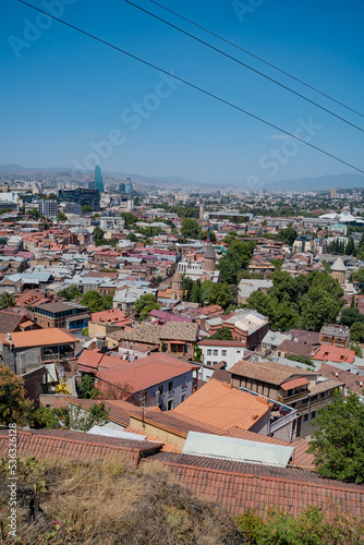 Tbilisi, Georgia - October 1 2022: Beautiful panoramic aerial view of Tbilisi at sunset photo