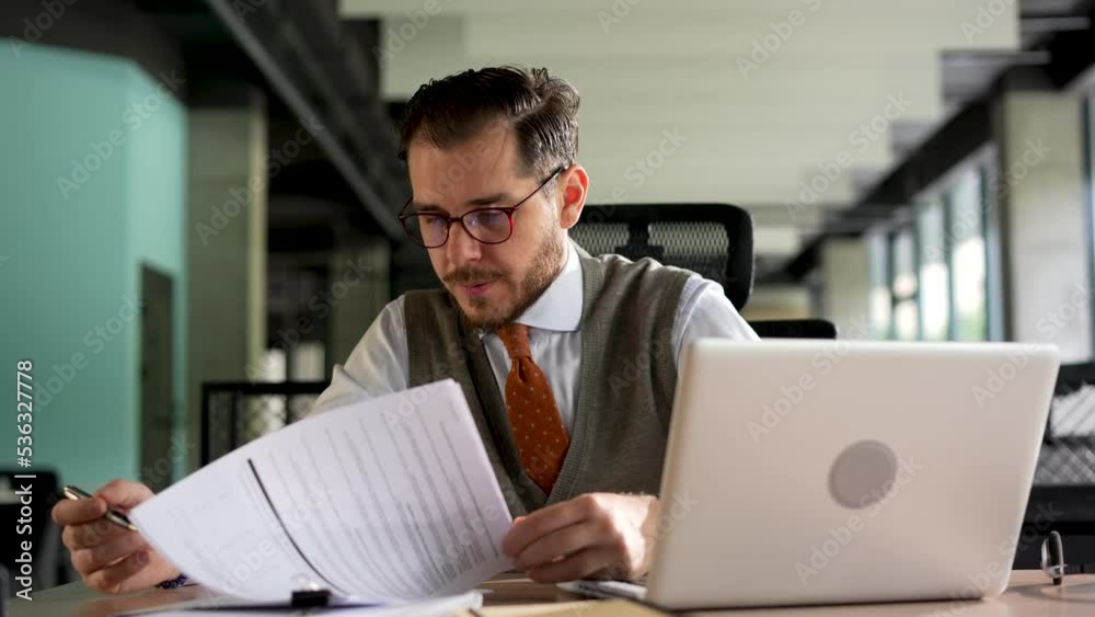 Business man checking documents in office closeup. Man hand analyze report. Unrecognizable financial manager lawyer study legal papers.