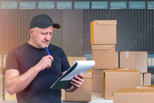 Businessman with boxes. Man...