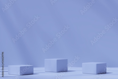 Three cubic pedestals on a blue background, 3d render