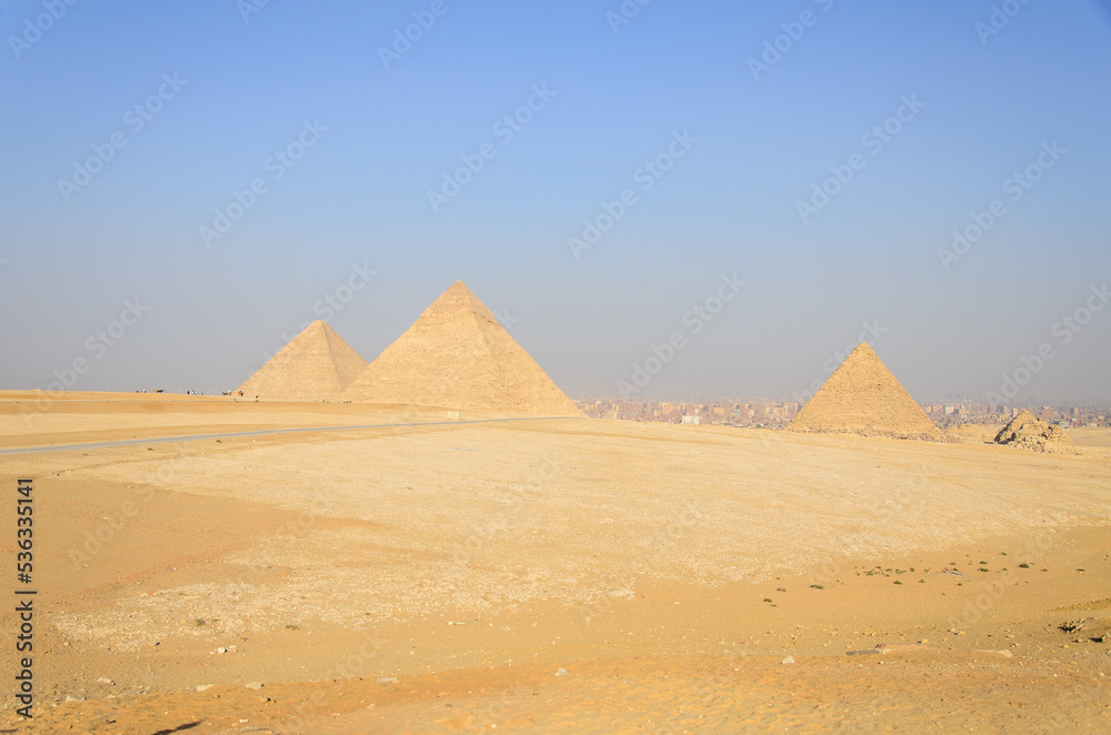 Summer Pyramids of Giza on a sunny afternoon