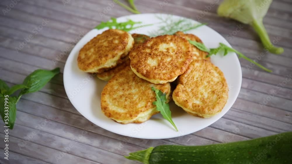 fried vegetable pancakes from squash and zucchini with herbs fried vegetable pancakes from squash and zucchini with herbs