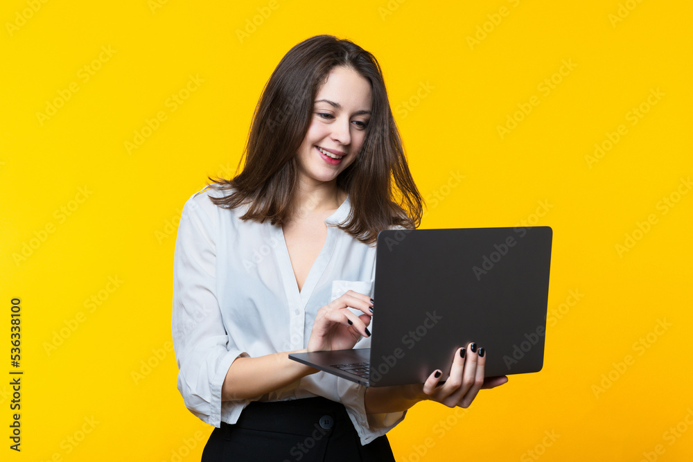 Business and finance. Cute young woman with laptop. Business and finance. Cute young woman with laptop.