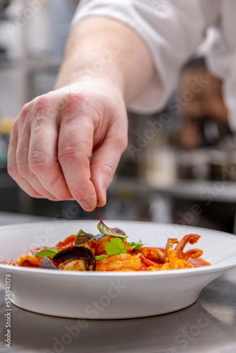 Cook and dish in the kitchen