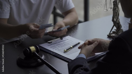 Attorney's Law Office Hiring a Contractor Seal the agreement. Hand in hand with corruption. Legal advisor concept. 4k UHD
