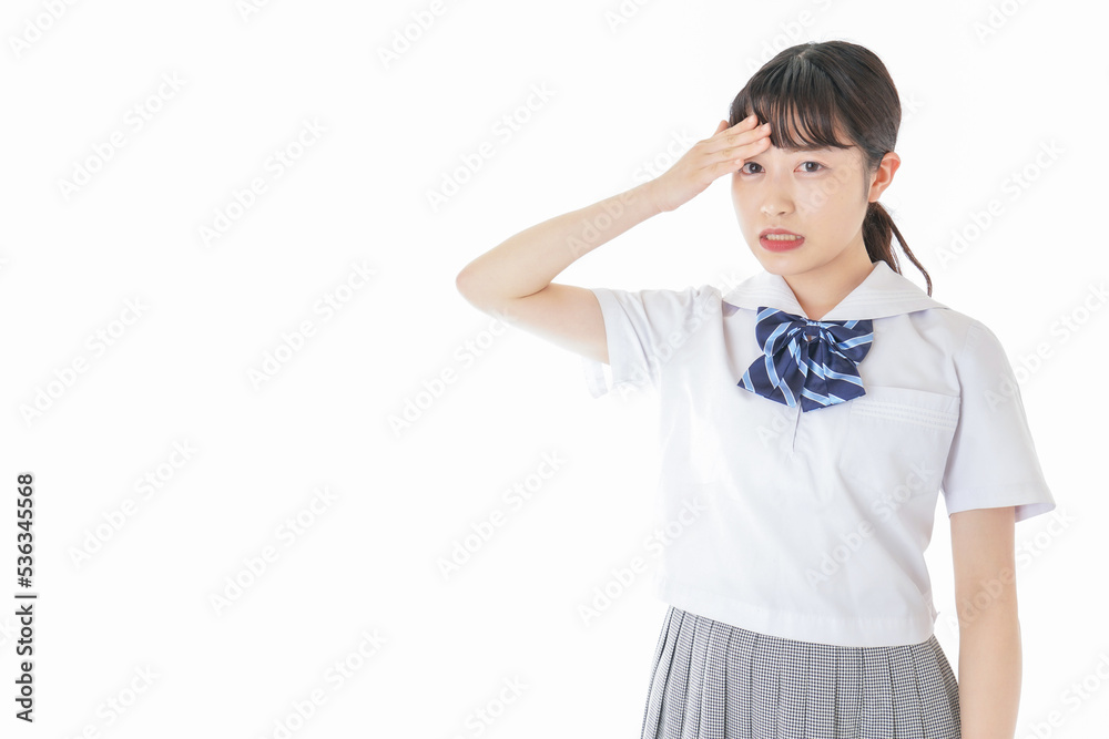 頭痛に苦しむ若い女子学生 頭痛に苦しむ若い女子学生
