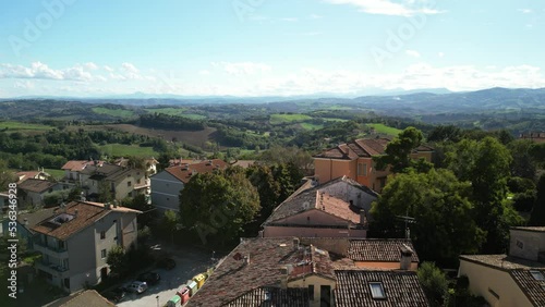 aerial view with drone of a medieval village in the middle of the Italian hills