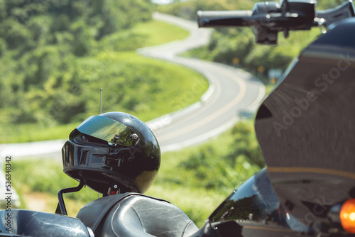 Helmets are placed on large motorcycles. Driving safety concept Travel concept.