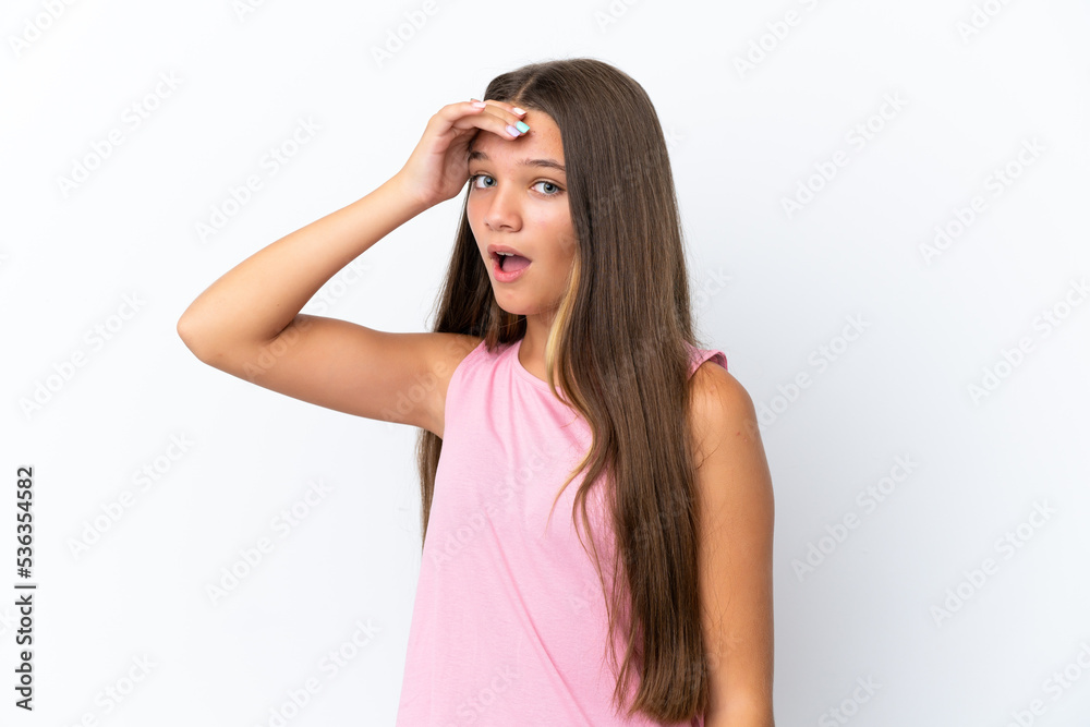 Little caucasian girl isolated on white background doing surprise gesture while looking front Little caucasian girl isolated on white background doing surprise gesture while looking front