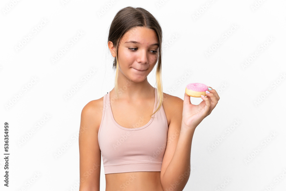 Little caucasian girl isolated on white background holding a donut Little caucasian girl isolated on white background holding a donut