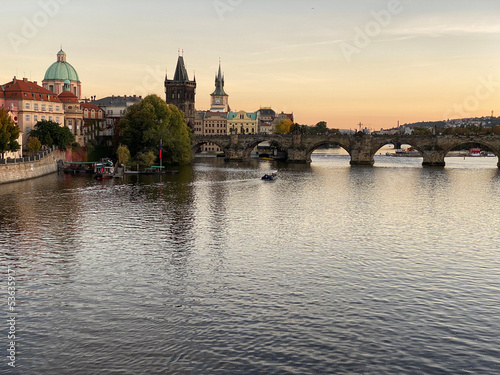Sunset with a view on the Vltava River and Charles Bridge © Cavan