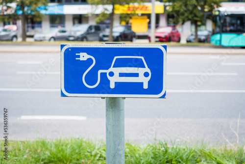 Public electrical vehicle charging point traffic sign. Electric car charging station sign.