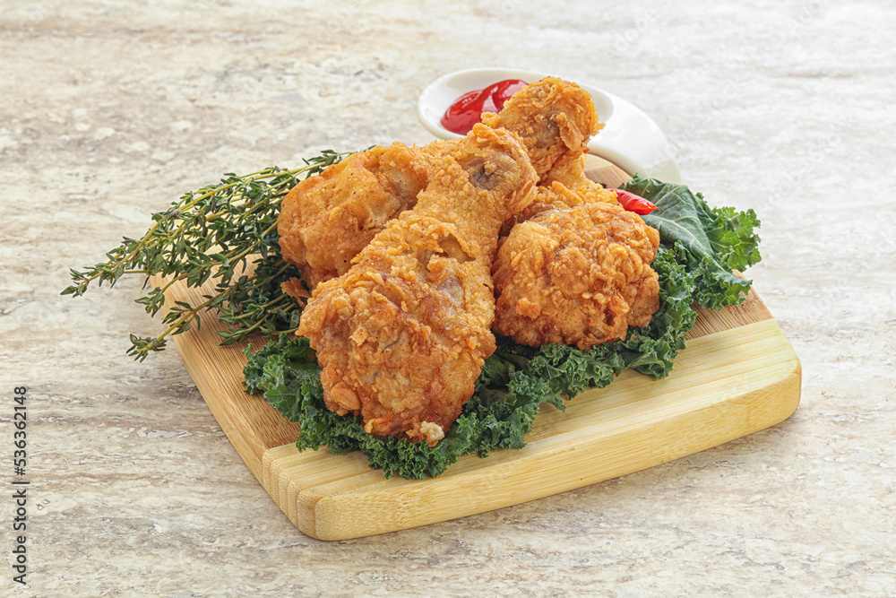 Fried chicken drumsticks with tomato sauce Fried chicken drumsticks with tomato sauce