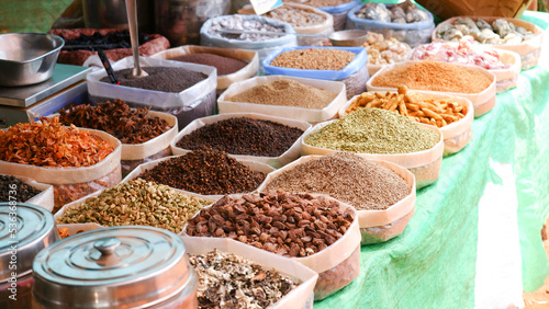 Different types of masala or spices on display for sale.