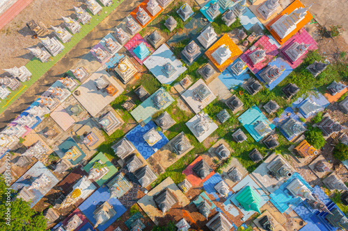 Aerial top view of colorful Thai Shrine. Buddhist temple pagoda. Pattern texture background.