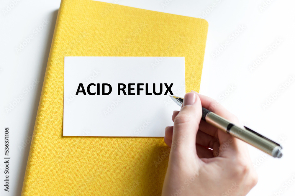 ACID REFLUX text written in card. Medical concept. ACID REFLUX text written in card. Medical concept.