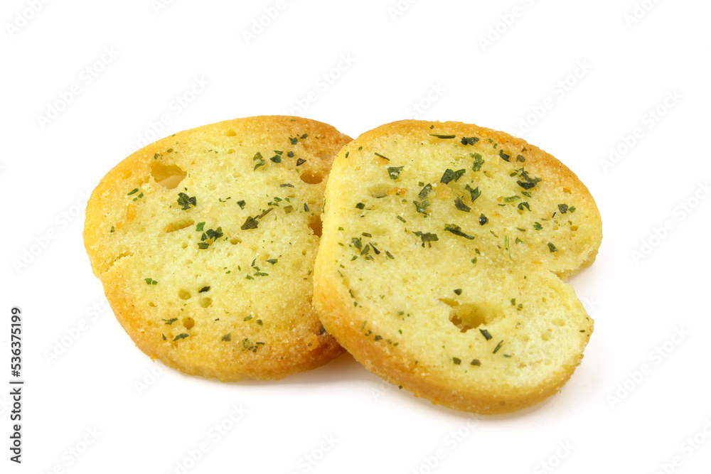 Two herb seasoned bruschette chips isolated on white background Two herb seasoned bruschette chips isolated on white background