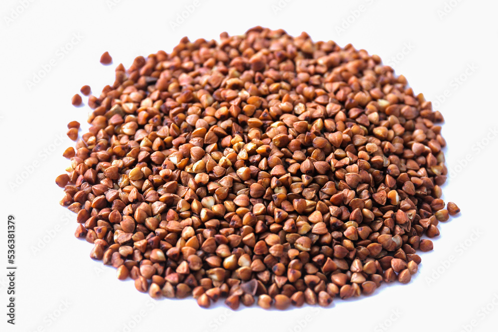Buckwheat grains on a white background Buckwheat grains on a white background