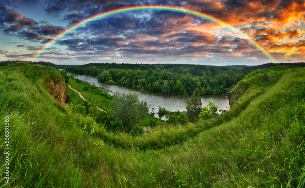 Fototapeta premium Landscape with a Rainbow on the River in Spring. colorful morning. nature of Ukraine